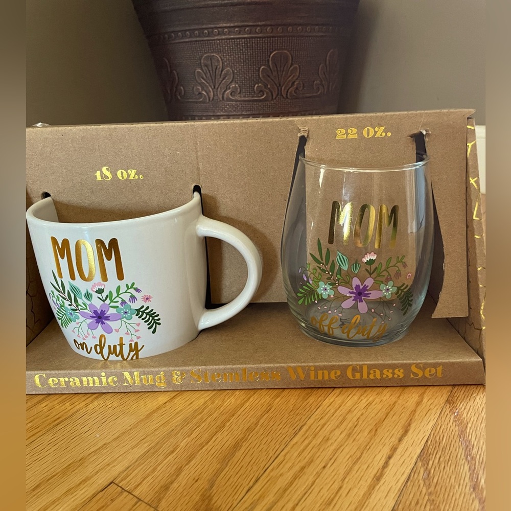 New still in box. Coffee mug and wine glass.